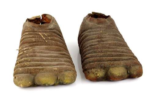 Lot 3080 - Doctor Who - Original Mestor (Edwin Richfield) feet from The Twin Dilemma (1984), 30cm long.