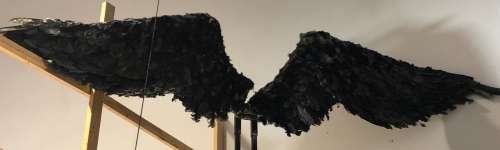 Lot 446 - Animatronic Poseable Black feathered wings - Used in several shows. - Latest used in "Smallville"