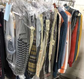 The American Horror Mystery-Thriller Show | Rack lot of assorted outfits - includes shirts / sweaters / sweatpants / plaid rain jackets / hospit | Direct Liquidation