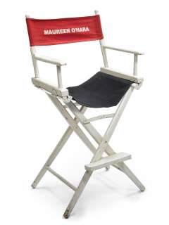Lot 233 - Maureen O‘Hara‘s white director‘s chair with black seat and three seat backings