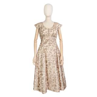 Claire Foy (as the Queen): A layered floral tea dress Season 1, Episode 8, ’Pride & Joy’ | Bonhams