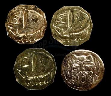 HOBBIT, THE: THE BATTLE OF THE FIVE ARMIES (2014) - Lot 454 - Set of Four of Smaug‘s (Benedict Cumberbatch) Coins