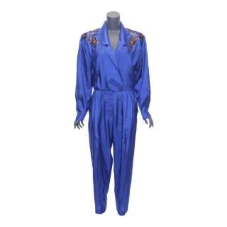 The Goldbergs | Beverly Goldberg’s (as played by Wendi McLendon-Covey) "Moms Need Other Moms" Blue Jumpsuit | Propstore