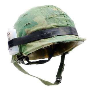 FULL METAL JACKET (1987) - Lot 790 - Private Cowboy‘s (Arliss Howard) Helmet Cover with Insect Repellent Bottle and Vietnam-Era Helmet