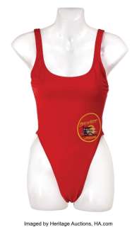 Pamela Anderson swimsuit from Baywatch with buoy and signed photo. ...