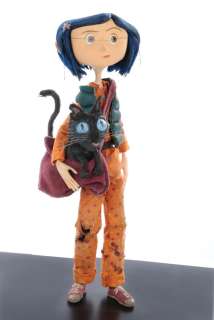 Lot 1706 - "Coraline" hero animation puppet with "The Cat" puppet, accessories & alternate faces from Coraline.