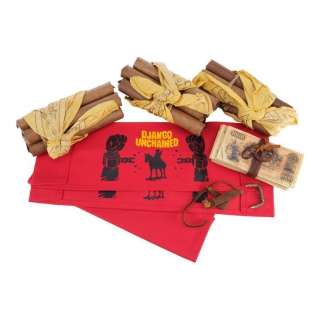 DJANGO UNCHAINED (2012) - Lot 618 - 618. Dr. King Schultz‘s (Christoph Waltz) Dynamite, Money, and Tooth Vault Key with Two Cast Chairbacks