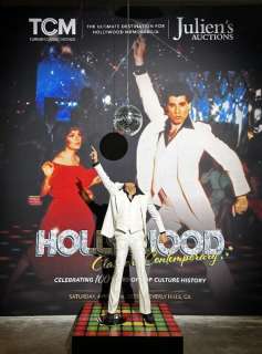 JOHN TRAVOLTA: SCREEN-MATCHED AND PHOTO-MATCHED "SATURDAY NIGHT FEVER" SUIT (WITH SIGNED PHOTOS, LOBBY CARDS, PRESS KIT, ALBUM, AND DVD) | Julien’s