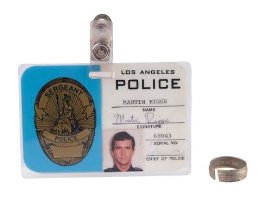 LETHAL WEAPON (1987) - Lot #251 : Mike Papac Collection: Martin Riggs‘ (Mel Gibson) Wedding Ring and Production-Made LAPD ID