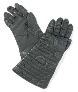 A pair of screen-worn black gloves from Star Wars: Episode IV–A New Hope, worn by Kermit Eller as Darth Vader in personal appearances | Bonhams