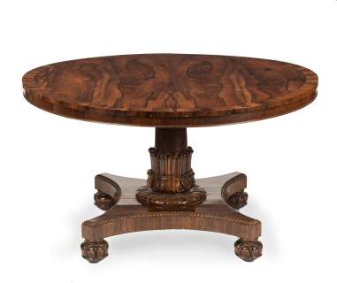 The Crown | A William IV rosewood centre or breakfast tableSourced for the Buckingham Palace set | Bonhams