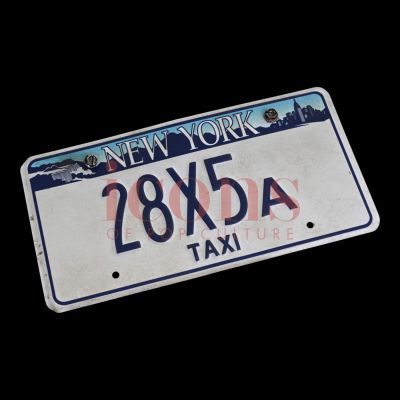 Lot 11 - Madame Web - Cassandra Webb’s (Dakota Johnson) Stolen Taxi License Plate - 65-11 - ICN-000579 | Icons of Pop Culture