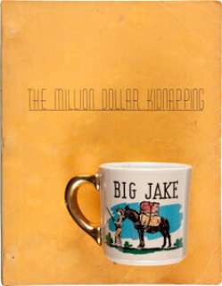 A Script and Coffee Mug from "Big Jake."