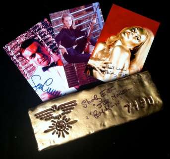 Lot 502 - Goldfinger (1964) Shirley Eaton Autographed Gold Bar & Poster