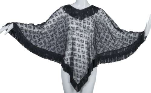 Lot 1341 - ALMOST FAMOUS: FAIRUZA BALK "SAPPHIRE" SCREENWORN LACE FRINGE PONCHO (WITH DVD)