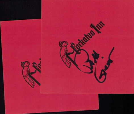 Lot 31 - Jackie Brown prop napkins signed