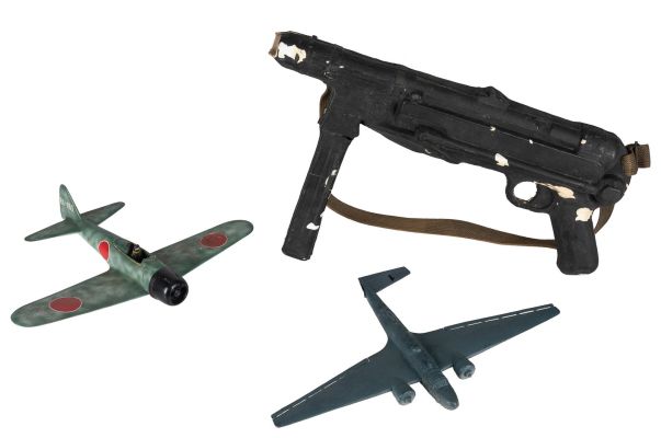 Lot 191 - JEIN, Greg (1945 - 2022). Pair of Miniature Model Planes and Prop Machine Gun from "1941". Universal | Potter & Potter