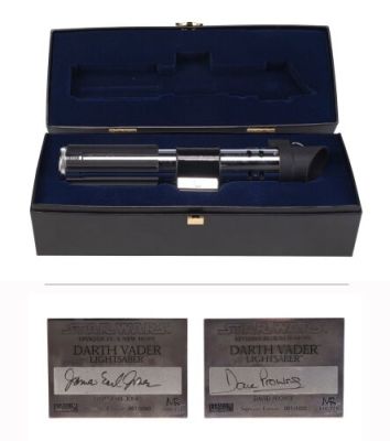 Star Wars: a New Hope (1977) | Lot 1215 : Master Replicas James Earl Jones and David Prowse Signature Edition Darth Vader Lightsaber Replica | Propstore