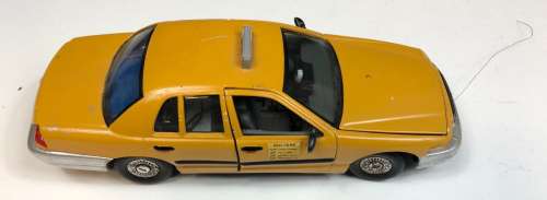 Lot 286 - Team America: World Police (2004) - Taxi Cab Miniature