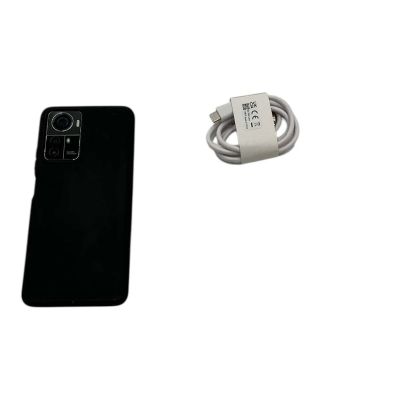 Lot 103: Play Dirty Grofield Screen Used Phone In Phone Case & Charge Cord | VIP Fan Auctions