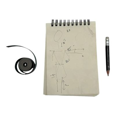 Lot 6: Mother Mary Sam Anselm Production Used Tape Measure & Sketch Pad W/ Pencil | VIP Fan Auctions