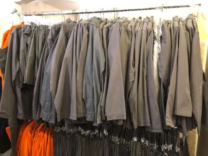 "Superhero Show" - Rack of Prison Outfits - includes Grey outfits & orange jumpsuits - approx. 165 p | Direct Liquidation