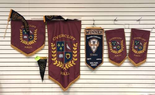 "The Magicians" - Group of assorted banners & flags includes Brakebills University & Over Cliff Hall | Direct Liquidation
