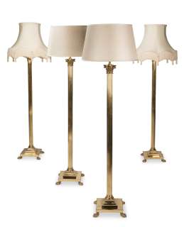 The Crown | A set of four brass column standard lamps First seen in Season 2, in the Cabinet Room set (4) | Bonhams