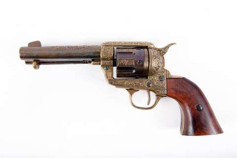 BURT REYNOLDS NON-FIRING PROP GUN WITH ENGRAVED BRONZE FINISH | Julien’s