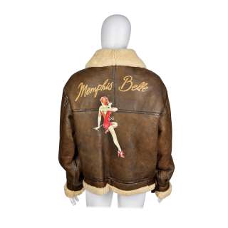 Lot 52 - Memphis Belle: A flying Jacket and other items relating to the production, Warner Bros., 1990, Qty