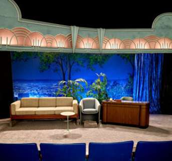 Johnny Carson’s Iconic Home Base Interview Desk, Swivel Chair, Guest Chair, Guest Couch, Coffee Table and Full Array of Set Elements from The Tonight Show Starring Johnny Carson (NBC TV, 1962-1992). (Total: 17 Items) | Heritage