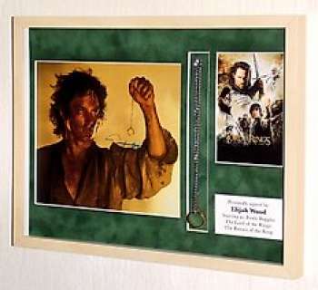Lord of the Rings - Lord of the Rings - Elijah Wood (Frodo Baggins) Premium Framed with engraved ring (prop), signed + COA
