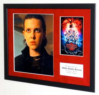 Stranger Things - Millie Bobby Brown (Eleven) Premium Framed, signed + Certificate of Authenticity | Catawiki