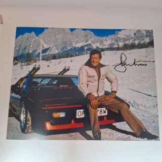 James Bond - Roger Moore as 007 (+2017) with Lotus - signed with Certified Genuine bc holographie COA | Catawiki