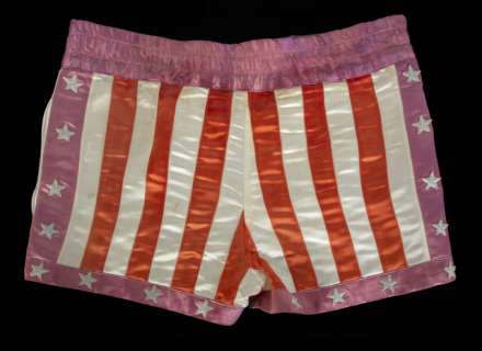 Lot 77 - SYLVESTER STALLONE "ROCKY BALBOA" SCREEN-MATCHED AMERICAN FLAG -VICTORY FIGHT- BOXING TRUNKS FROM "ROCKY III" (WITH DVD)