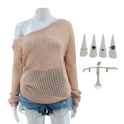 Lot 157: The Wrecking Crew Valentina Screen Worn Stunt Double Sweater, Shorts, (4) Rings & Earrings Ch 1 Sc 4 | VIP Fan Auctions