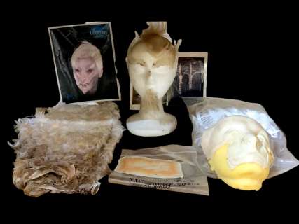 Lot 32 - The Magicians - screen used white lady face mask & accessories