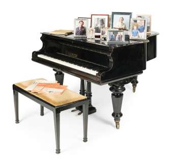 The Crown | An ebonised baby grand piano, made by C. GoetzeFirst seen in Season 6, in the Diana Kensington Palace Apartment set | Bonhams