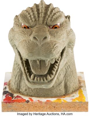 Godzilla vs. Charles Barkley Nike Commercial (ILM, 1992), Pair of Godzilla Head Maquettes and Additional Arm Appliance. (Total: 3 Items)