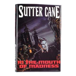 IN THE MOUTH OF MADNESS (1994) - Lot #677 : Sutter Cane‘s (Jurgen Prochnow) In the Mouth of Madness Hardback Book