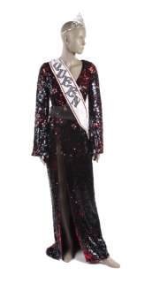 ELVIRA STAGE AND SCREEN-WORN "CARRIE" GOWN AND COSTUME PIECES FROM KNOTT’S SCARY FARM SHOW "ELVIRA’S SINEMA SEANCE" AND PHOTO-MATCHED "STATUE OF LIBERTY" SASH | Julien’s