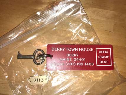 Lot 217 - IT CHAPTER 2 - Room key, fob Plus room 203 hutch number