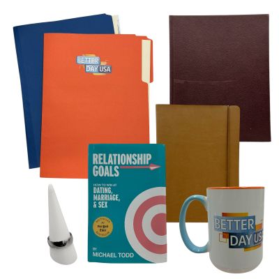 Lot #44: Relationship Goals Dan Milken Screen Used Folder With Paperwork, Desk Dressing, Ring, Cup & Relationship Goals