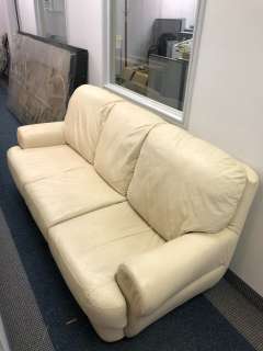 Leather 2pc sofa & loveseat set (off-white) from the sci-fi show | Direct Liquidation