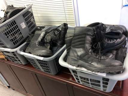 "Superheroes Show" Police Dept. liberty justice - 4 baskets full of Police boots | Direct Liquidation
