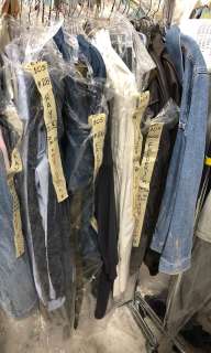 The American Horror Mystery-Thriller Show | Group of assorted Hero outfits - includes jean jackets / dress shirts / pants / belts / shirts / swe | Direct Liquidation