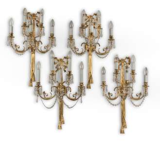 The Crown | A set of eight gilt-brass five-light wall appliques, in the Louis XVI style First seen in Season 6 (8) | Bonhams