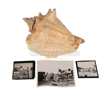 JAMES BOND: DR. NO (1962) - Lot 382 - Honey Ryder‘s (Ursula Andress) Conch Shell and On-set Black-and-white Photographs