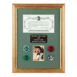 JAMES BOND: THE WORLD IS NOT ENOUGH (1999) - Lot 1286 - Elektra King‘s (Sophie Marceau) Cheque and Zukovsky (Robbie Coltrane) Casino Chips Display