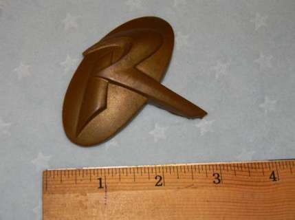 "Batman Forever" Prop Rubber ’Robin’ Insignia from Damaged Costume | Piece of the Past